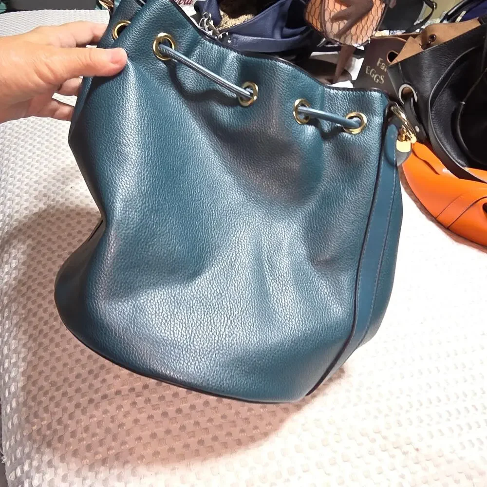 THE BUCKET TEAL DRAWSTRING BUCKET BAG